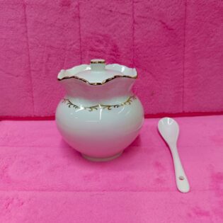 Sugar dish with spoon